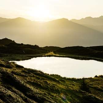 Alba al lago Pascuminer sull'Heinzenberg