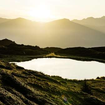 Alba al lago Pascuminer sull'Heinzenberg